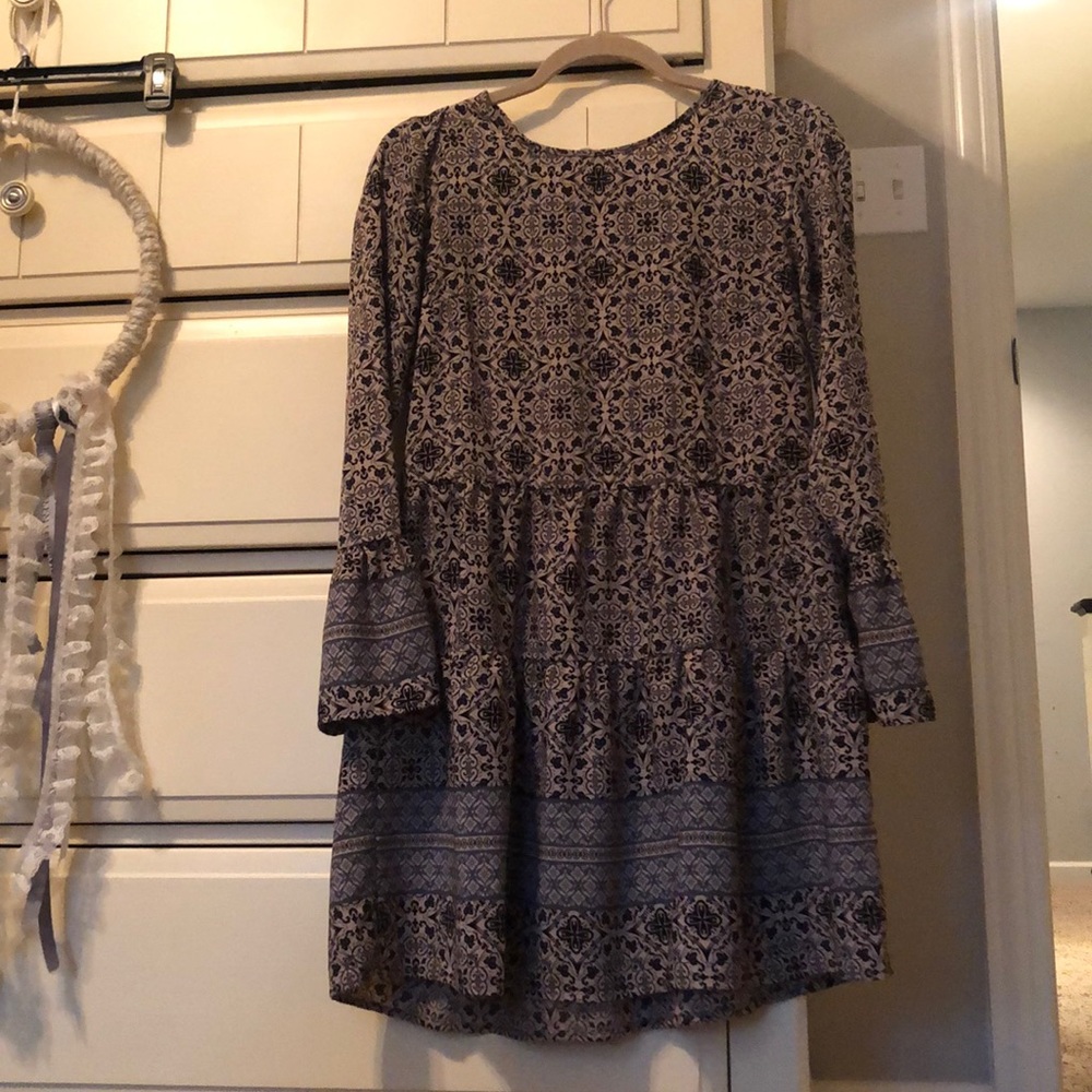 Patterned peplum dress with bell sleeves